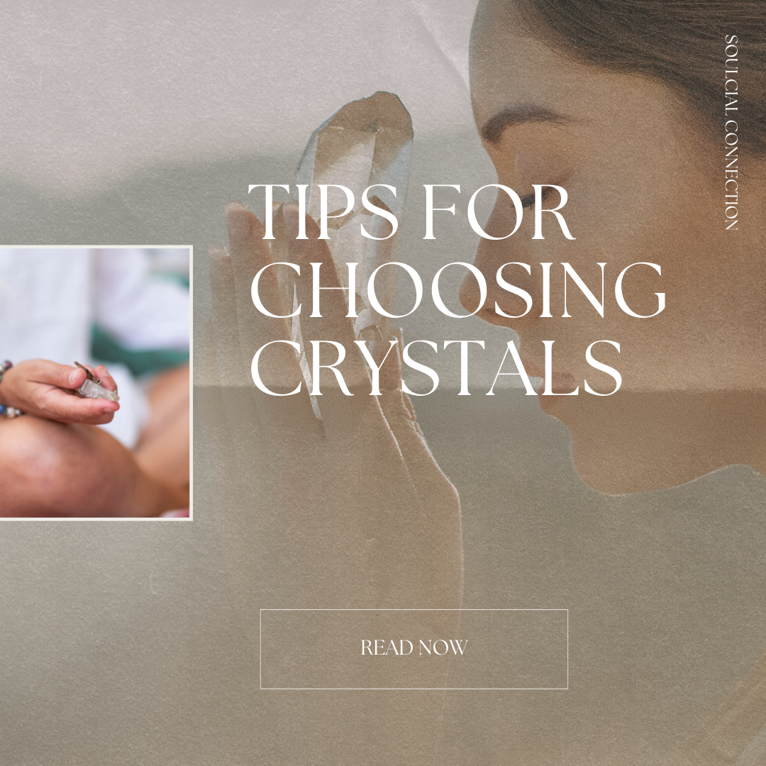 Woman holding a crystal in front of her face