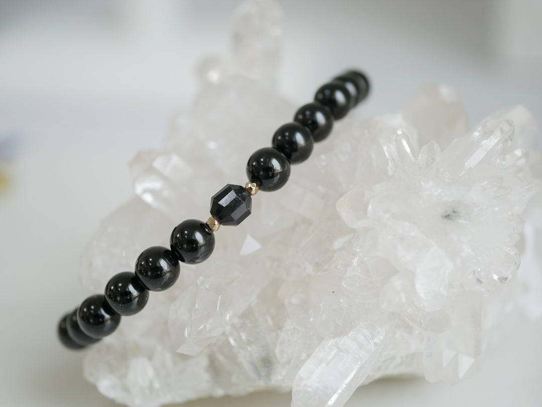 Double-terminated Black Tourmaline charm on stretch bracelet for energy balance
