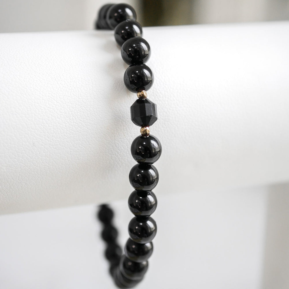 Close-up of handmade Black Tourmaline bracelet for protection