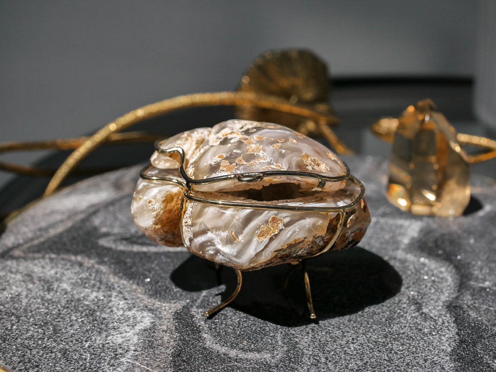 Agate geode ring holder holding multiple rings, closed